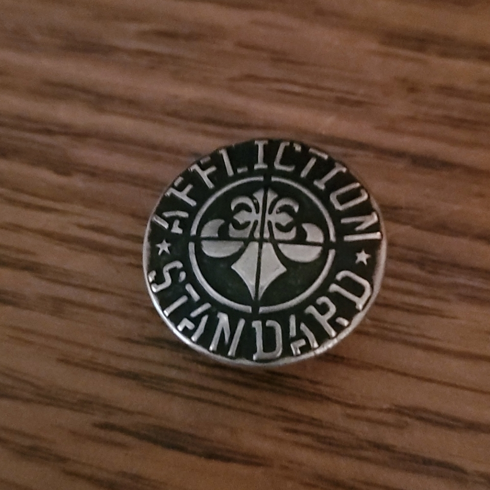 Affliction button